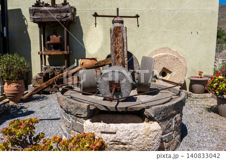 Ancient traditional stone olive oil press and milling mechanism Ancient traditional stone olive oil press and milling mechanism 140833042