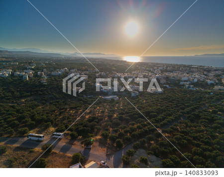 Aerial panoramic view of coastal mediterranean town at sunset Aerial panoramic view of coastal mediterranean town at sunset 140833093