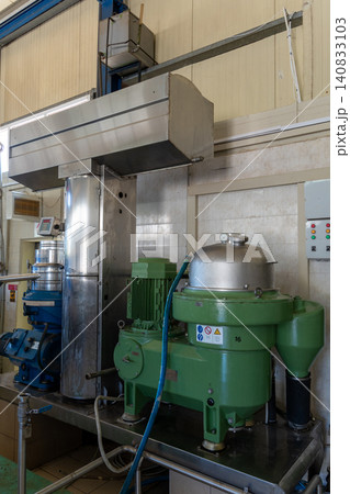 Industrial centrifuge separator machine in olive oil extraction factory 140833103