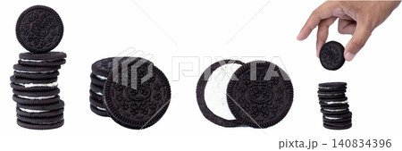 Hand hovers above a stack of cookies. Stacks rise beside the hand in motion. White background highlights every cookie's detail. No emotion shown, just the gesture. Perfect for food, snack Hand hovers above a stack of cookies. Stacks rise beside the hand in motion. White background highlights every cookie's detail. No emotion shown, just the gesture. Perfect for food, snack 140834396