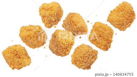 Golden fried chicken nuggets isolated on white background, crunchy breaded fast food pieces, snack and takeaway concept, full depth of field Golden fried chicken nuggets isolated on white background, crunchy breaded fast food pieces, snack and takeaway concept, full depth of field 140834755