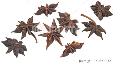 Star anise isolated on white background, falling aromatic dried spice for cooking and baking Star anise isolated on white background, falling aromatic dried spice for cooking and baking 140834812
