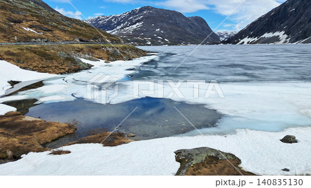Scenic route in Norway with fjords, snow, ice and lakes with beautiful landscapes Scenic route in Norway with fjords, snow, ice and lakes with beautiful landscapes 140835130