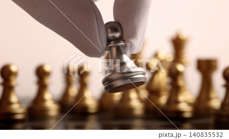 Chess board. Close up chesses strategy concept of silver and gold chess on classic board. Hand carefully moves a piece symbolizing planning decision making leadership competition tactics and success. Chess board. Close up chesses strategy concept of silver and gold chess on classic board. Hand carefully moves a piece symbolizing planning decision making leadership competition tactics and success. 140835532