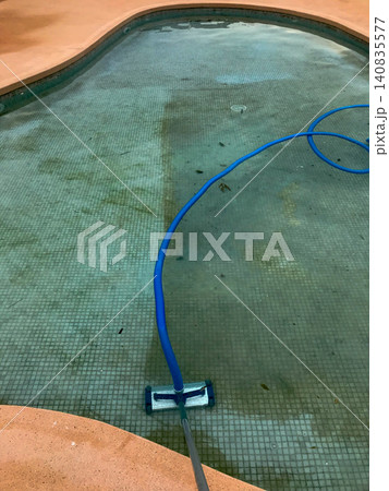 Cleaning swimming pool bottom with vacuum before and after Cleaning swimming pool bottom with vacuum before and after 140835577