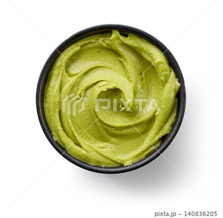 bowl of pistachio spread isolated on white background 140836205