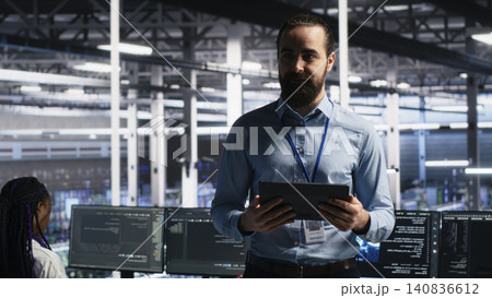 Data center manager presents machine learning hardware and predictive maintenance technology to investors. Data center manager presents machine learning hardware and predictive maintenance technology to investors. 140836612