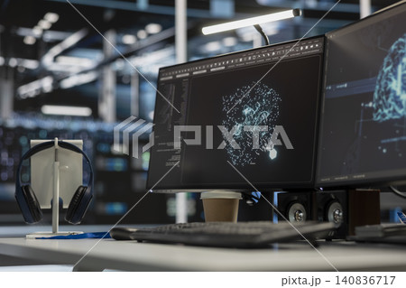Server equipment uses a desktop computer in a server room to manage AI systems and optimize server infrastructure. 140836717