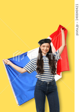 Young woman waves flags, showcasing culture and joy. Travel and cultural pride concept Young woman waves flags, showcasing culture and joy. Travel and cultural pride concept 140840421
