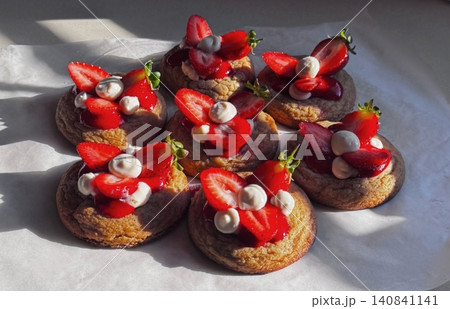 Freshly baked cookies with a golden-brown finish and chocolate chips. Perfectly crisp on the edges with a soft center, offering a delicious, comforting treat for any occasion. 140841141
