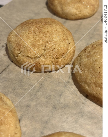 Freshly baked cookies with a golden-brown finish and chocolate chips. Perfectly crisp on the edges with a soft center, offering a delicious, comforting treat for any occasion. Freshly baked cookies with a golden-brown finish and chocolate chips. Perfectly crisp on the edges with a soft center, offering a delicious, comforting treat for any occasion. 140841712