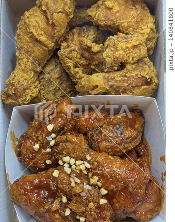 Crispy fried chicken with golden, crunchy skin and juicy, tender meat. A delicious and savory dish, perfect for any meal, served with dipping sauces or side dishes for extra flavor! Crispy fried chicken with golden, crunchy skin and juicy, tender meat. A delicious and savory dish, perfect for any meal, served with dipping sauces or side dishes for extra flavor! 140841800