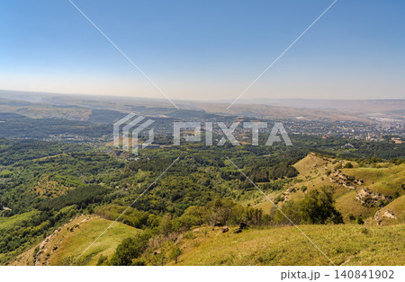 View of the mountains and Kislovodsk from the observation decks of the Kislovodsk Park View of the mountains and Kislovodsk from the observation decks of the Kislovodsk Park 140841902