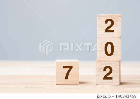 wooden cube block with 2027 text on table background. Resolution, plan, review, goal, start and New Year holiday concepts wooden cube block with 2027 text on table background. Resolution, plan, review, goal, start and New Year holiday concepts 140842459
