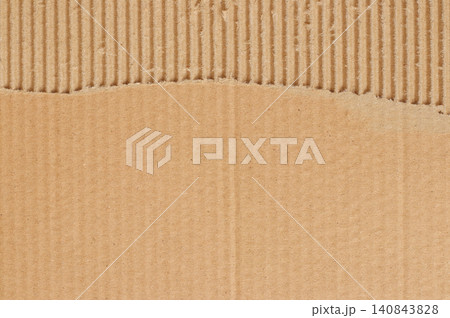 Brown cardboard sheet abstract background, texture of recycle paper box in old vintage pattern with ripped edges. 140843828