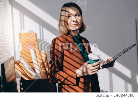 Fashion designer woman and typing on laptop in shop for email project or online order of fabric in creative startup Serious tailor computer and small business for clothes or textile in : Generative AI Fashion designer woman and typing on laptop in shop for email project or online order of fabric in creative startup Serious tailor computer and small business for clothes or textile in : Generative AI 140844300