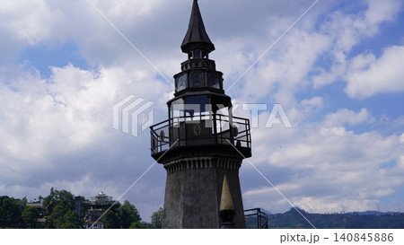 Architectural Wonder Lighthouse Against Cloudy Sky Architectural Wonder Lighthouse Against Cloudy Sky 140845886