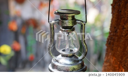 Vintage Style Hanging Lantern with Blurred Background 140845909