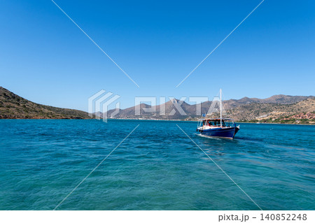 Tourist Boat Cruising Mirabello Bay in Elounda Crete Tourist Boat Cruising Mirabello Bay in Elounda Crete 140852248