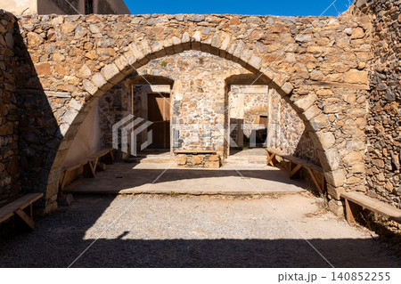 Ancient Venetian Stone Arch and Ruins on Spinalonga Island Ancient Venetian Stone Arch and Ruins on Spinalonga Island 140852255