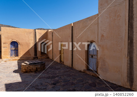 Historical Village Courtyard with Ancient Well on Spinalonga Island Historical Village Courtyard with Ancient Well on Spinalonga Island 140852260