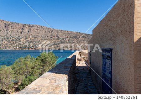 Spinalonga Island Fortification Wall Facing Blue Sea in Crete Spinalonga Island Fortification Wall Facing Blue Sea in Crete 140852261