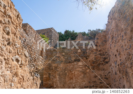 Ruins of Ancient Venetian Stone Fortress on Spinalonga Island Ruins of Ancient Venetian Stone Fortress on Spinalonga Island 140852263