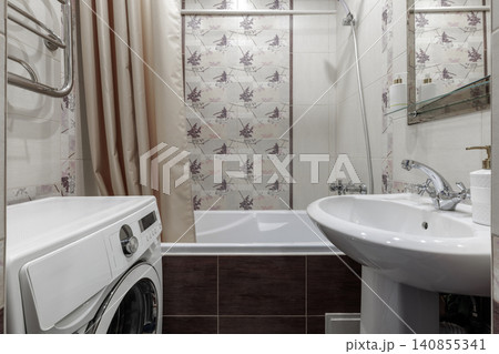 Bathroom Interior with Washing Machine Bathtub and Ceramic Sink Bathroom Interior with Washing Machine Bathtub and Ceramic Sink 140855341