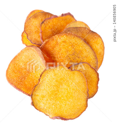 Crispy roasted sweet potato chips with sea salt, isolated on white background. Healthy and crunchy natural vegetable snack. Clipping path. Crispy roasted sweet potato chips with sea salt, isolated on white background. Healthy and crunchy natural vegetable snack. Clipping path. 140856905