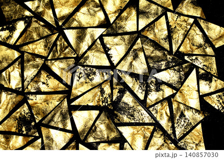 Gold metallic geometric triangle paint background on black paper Gold metallic geometric triangle paint background on black paper 140857030