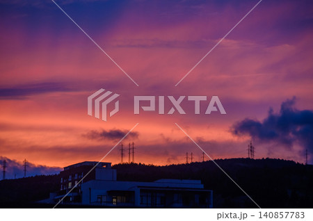 Fiery Dramatic Sunset with Deep Purple and Orange Skies Over Tbilisi Cityscape Fiery Dramatic Sunset with Deep Purple and Orange Skies Over Tbilisi Cityscape 140857783
