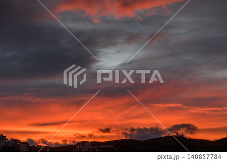 Striking Dramatic Sunset with Dark Cumulus Clouds Over Tbilisi Valley Striking Dramatic Sunset with Dark Cumulus Clouds Over Tbilisi Valley 140857784