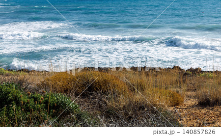 Sea wave texture and turquoise water near cliffs. Sea wave texture and turquoise water near cliffs. 140857826