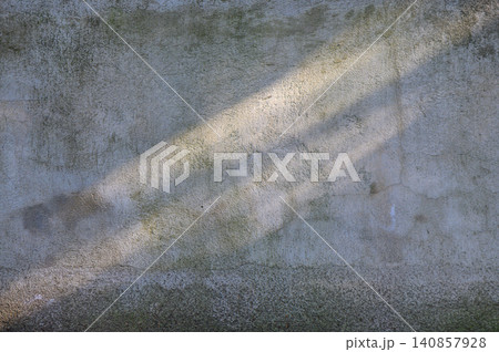 Texture of an Old Concrete Wall with Cracks and Weathering 140857928