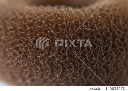 Hair Donut Roller Texture Made of Porous Nylon Mesh for Voluminous Bun Hair Donut Roller Texture Made of Porous Nylon Mesh for Voluminous Bun 140858078