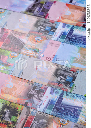Kuwait paper money, dinar banknotes as currency for exchange or travel. Kuwaiti money Kuwait paper money, dinar banknotes as currency for exchange or travel. Kuwaiti money 140858268