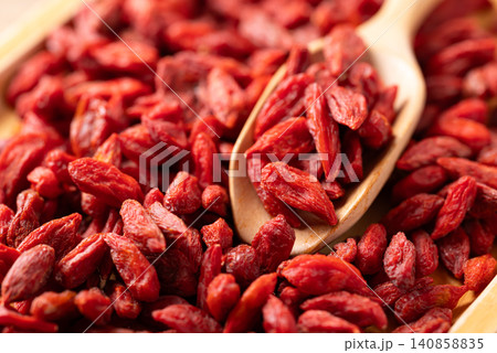 Organic dried goji berries in a wooden scoop. Healthy food 140858835