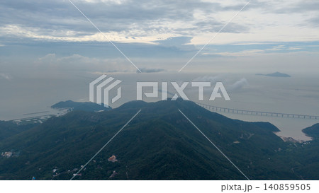 Hong Kong. June 27 2026 Tsim Fung Shan misty ridgeline landscape Hong Kong. June 27 2026 Tsim Fung Shan misty ridgeline landscape 140859505