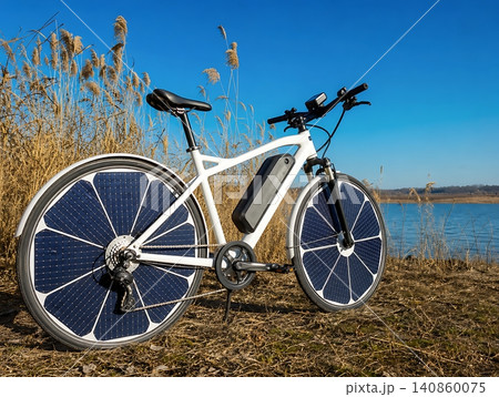 White bicycle with basket on dirt path by water lake White bicycle with basket on dirt path by water lake 140860075