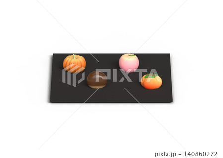 黒いお盆に並んだカボチャや栗の形の可愛い秋の和菓子セット 140860272