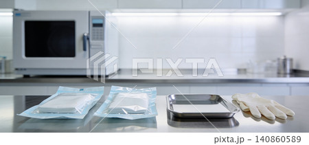 Sterile medical supplies and instruments laid out on a clean laboratory counter Sterile medical supplies and instruments laid out on a clean laboratory counter 140860589