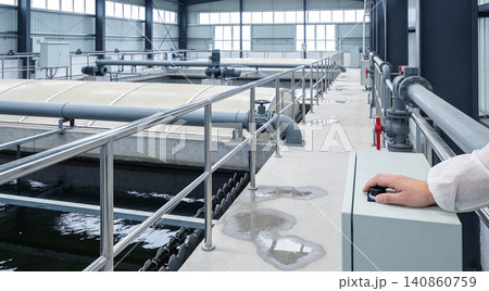 Modern industrial water treatment facility with advanced filtration and control systems Modern industrial water treatment facility with advanced filtration and control systems 140860759