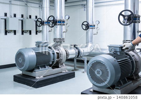 Industrial pumps and piping system in a clean, modern facility 140861058