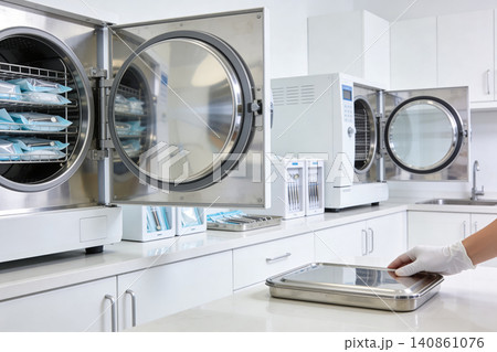 Sterilization equipment in a clean medical or dental clinic setting Sterilization equipment in a clean medical or dental clinic setting 140861076