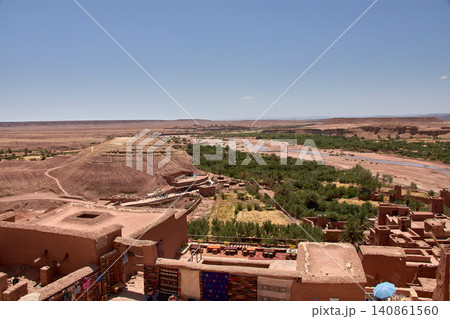 The Ksar of Ait Benhaddou rises majestically above the desert valley of Ouarzazate, Morocco. 140861560