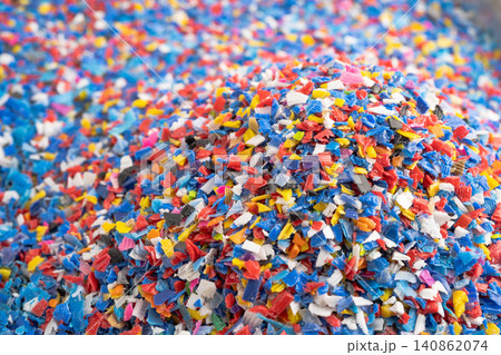 Plastic colorful pieces recycling shredded for industrial use. Plastic colorful pieces recycling shredded for industrial use. 140862074