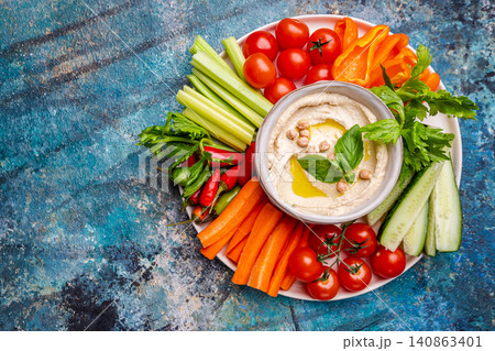 Hummus platter with assorted snacks. Hummus platter with assorted snacks. 140863401
