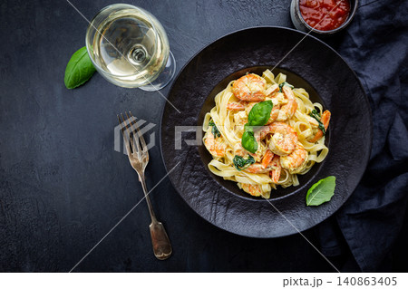 pasta in a creamy sauce with shrimp pasta in a creamy sauce with shrimp 140863405