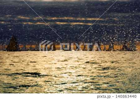 A lot of sailing boats through splashing water at sunset, Sailing regatta in the Gulf of Finland at sunset, hot race of several yachts, teamwork 140863440