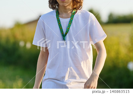 Person wearing sunflower lanyard for invisible disability awareness Person wearing sunflower lanyard for invisible disability awareness 140863515